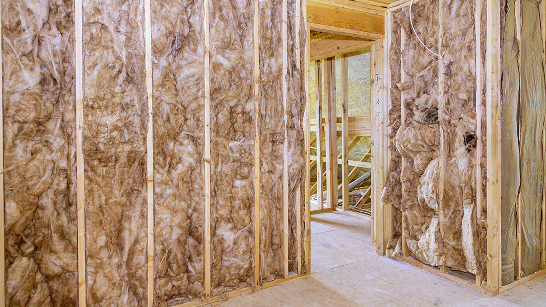 Acoustic roll insulation installed in timber framing