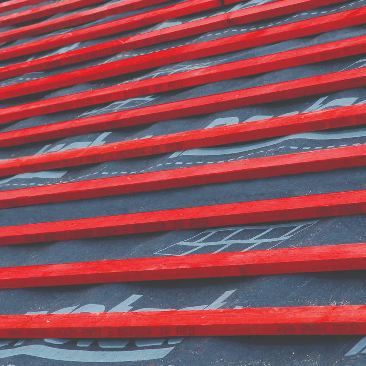 Red roofing battens on a roof