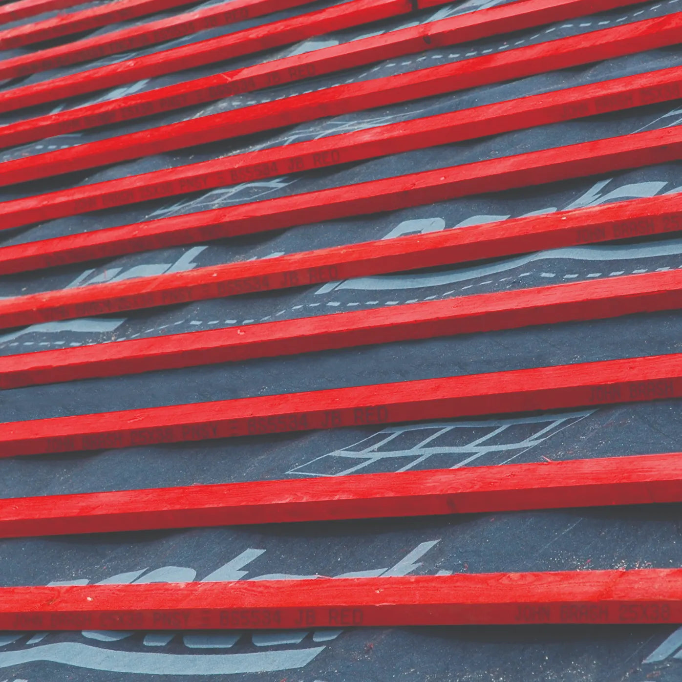 Red roofing battens on a roof