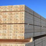 C24 treated timber stacked on a wagon